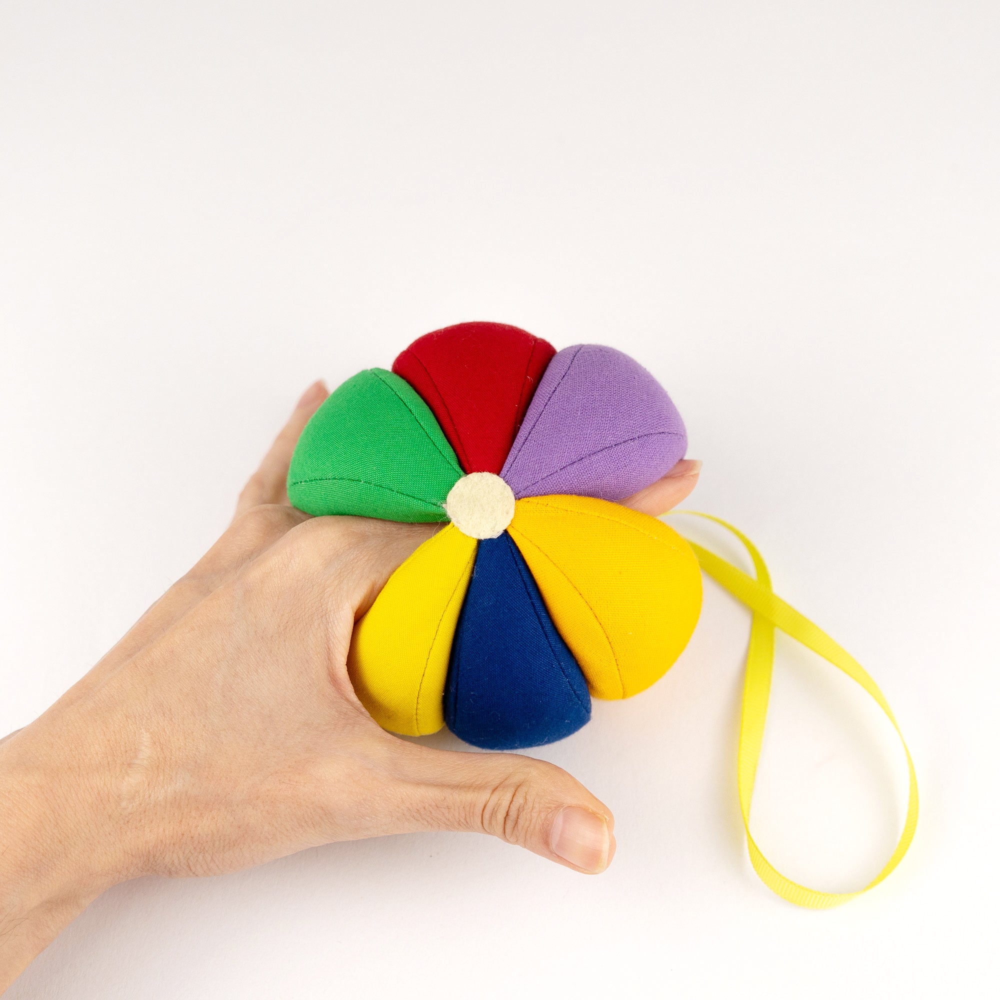 Balle d’éveil sensoriel arc-en-ciel