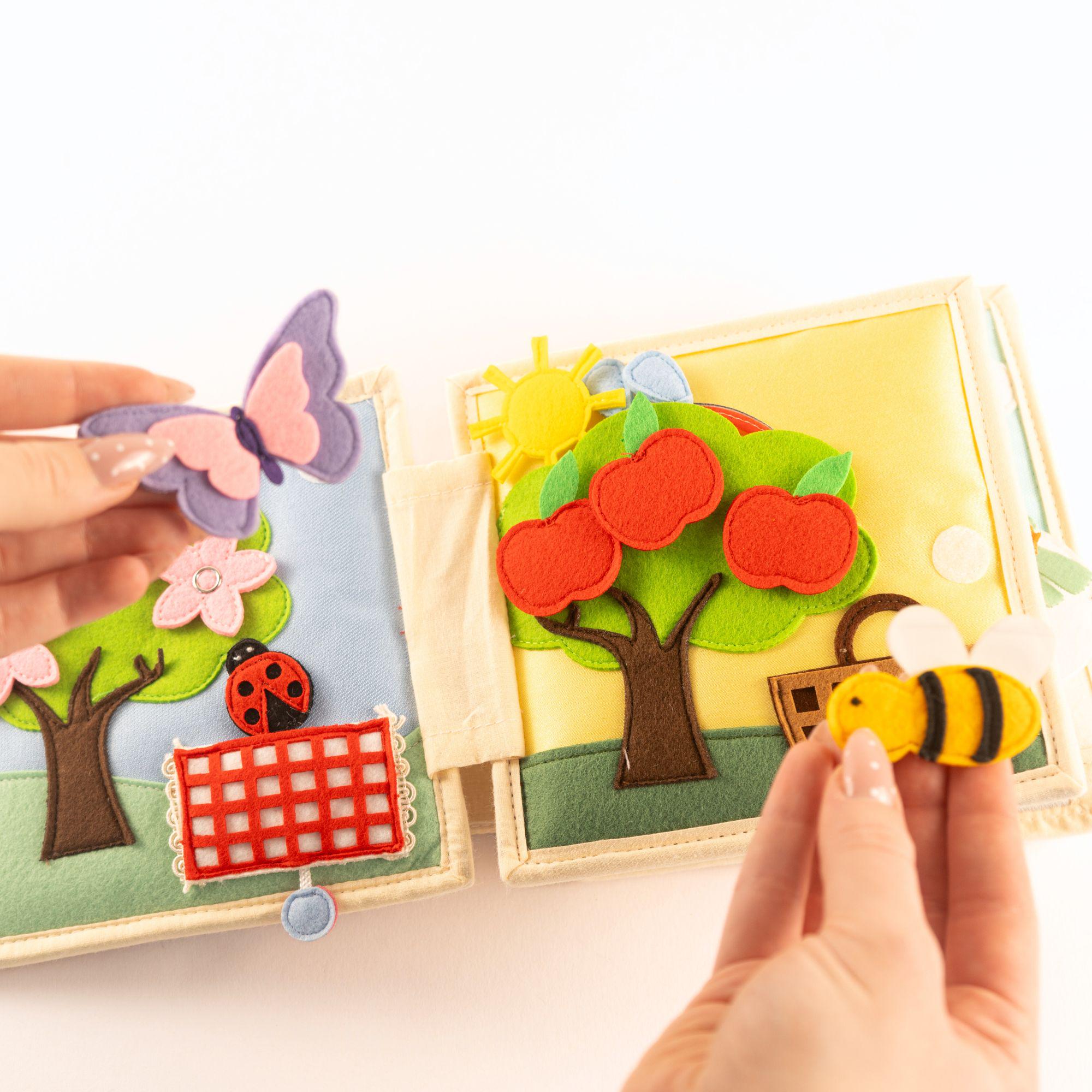 Mini Quiet Book Schneeflocke bis Sonnenschein  Stoffbuch zum Anziehen, Jahreszeiten lernen & Selbstständigkeit fördern